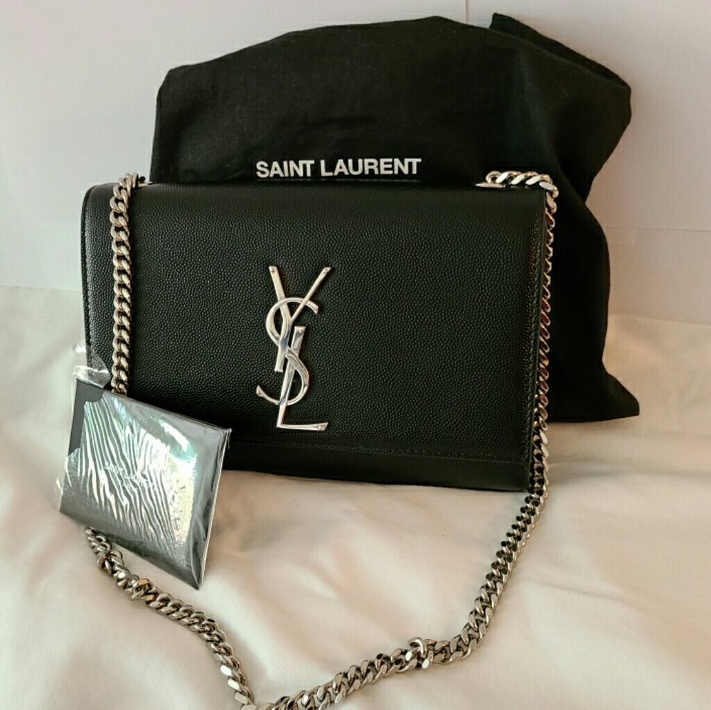 A never used yvs saint laurent purse/clutch